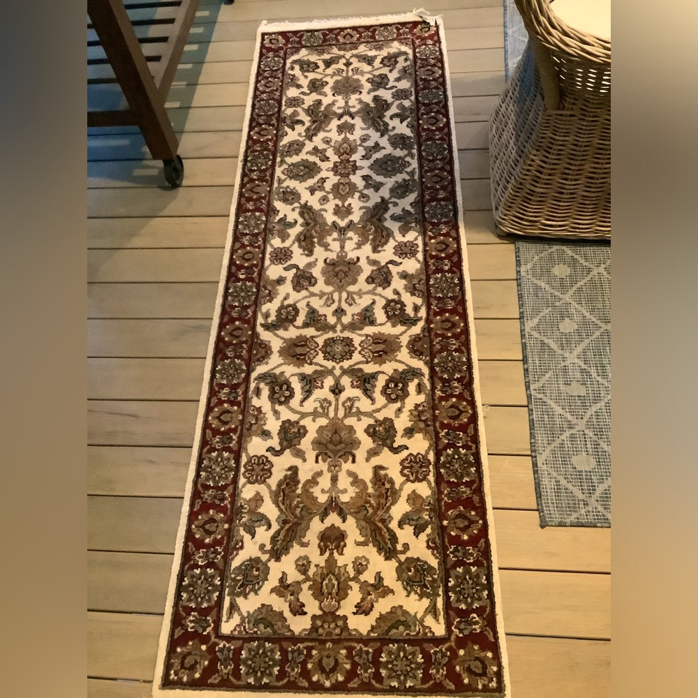 Handmade ivory wool antique rug